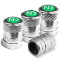 Silver tire valve stem caps with green N2 inserts and diamond-pattern grip (4-pack)