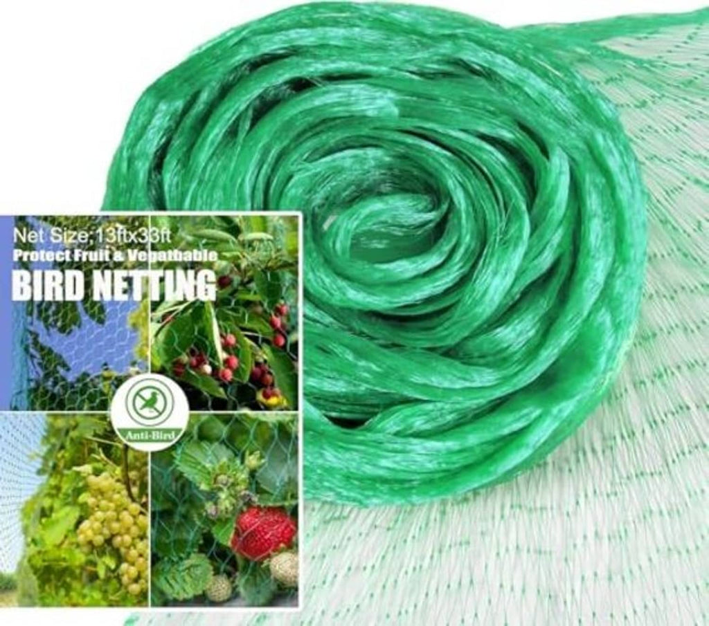 Green and white bird netting roll, tightly coiled fine grid mesh for protection