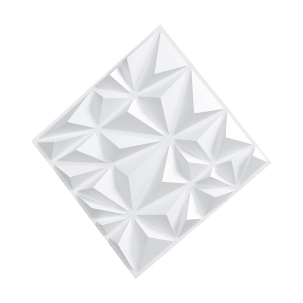 Close-up of white 3D diamond-relief wall panel tile with sharp geometric peaks