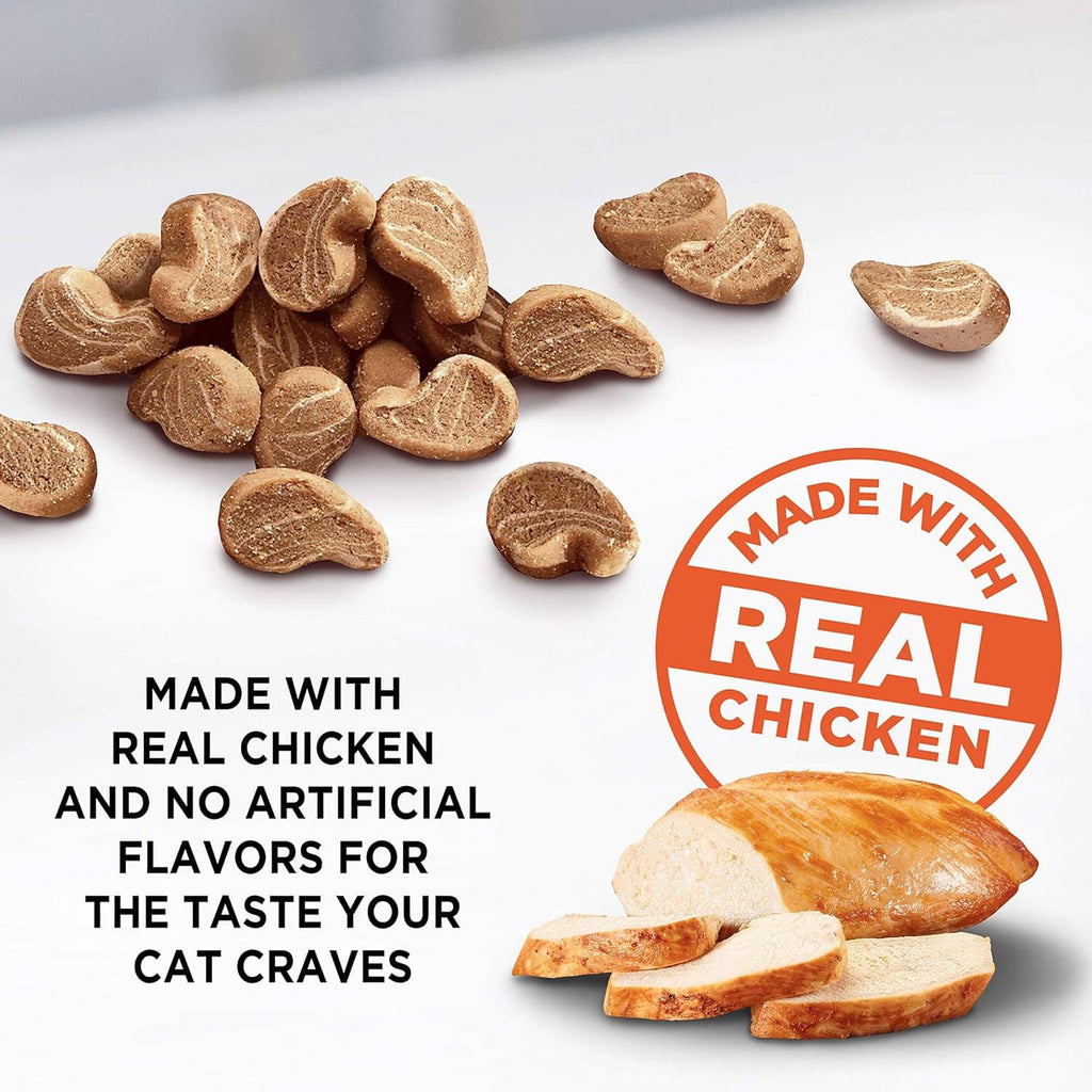 Soft cat treats pieces, light brown ovals with crimped edges