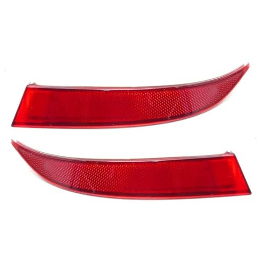 Two red curved rear bumper reflector lenses with textured reflective pattern