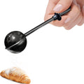 Black powdered sugar shaker duster with long handle and round perforated cup