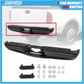 Black rear step bumper with textured tread and mounting bracket holes