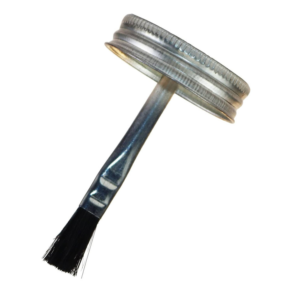 Brush-top applicator with bristle brush and metal cap
