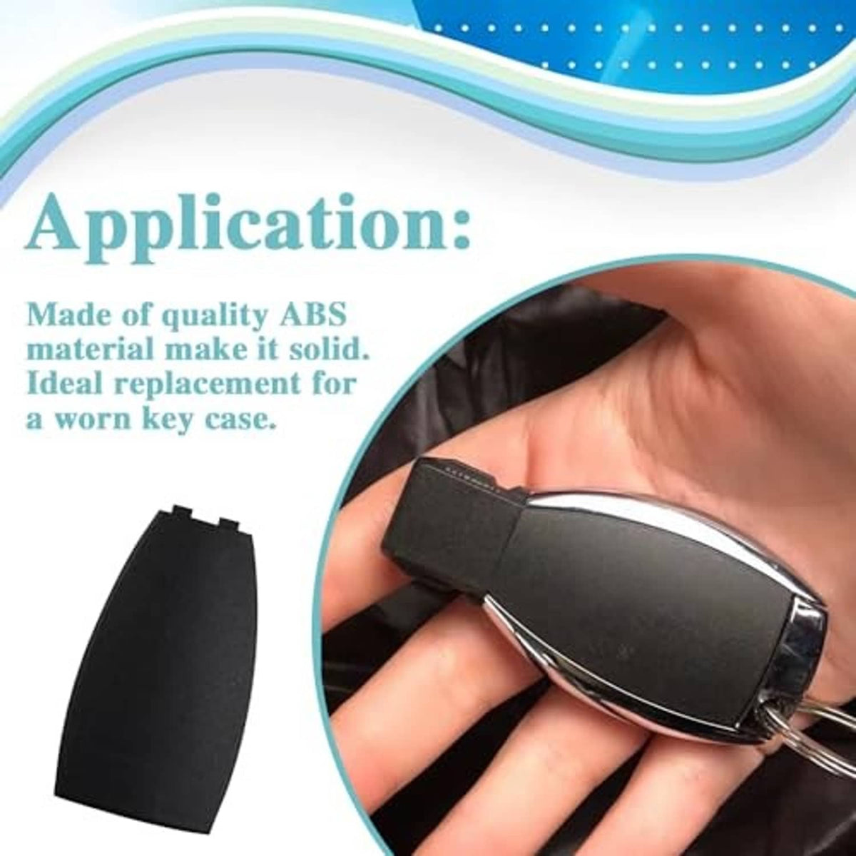 Black key fob rear cover shell held in hand, curved matte finish.