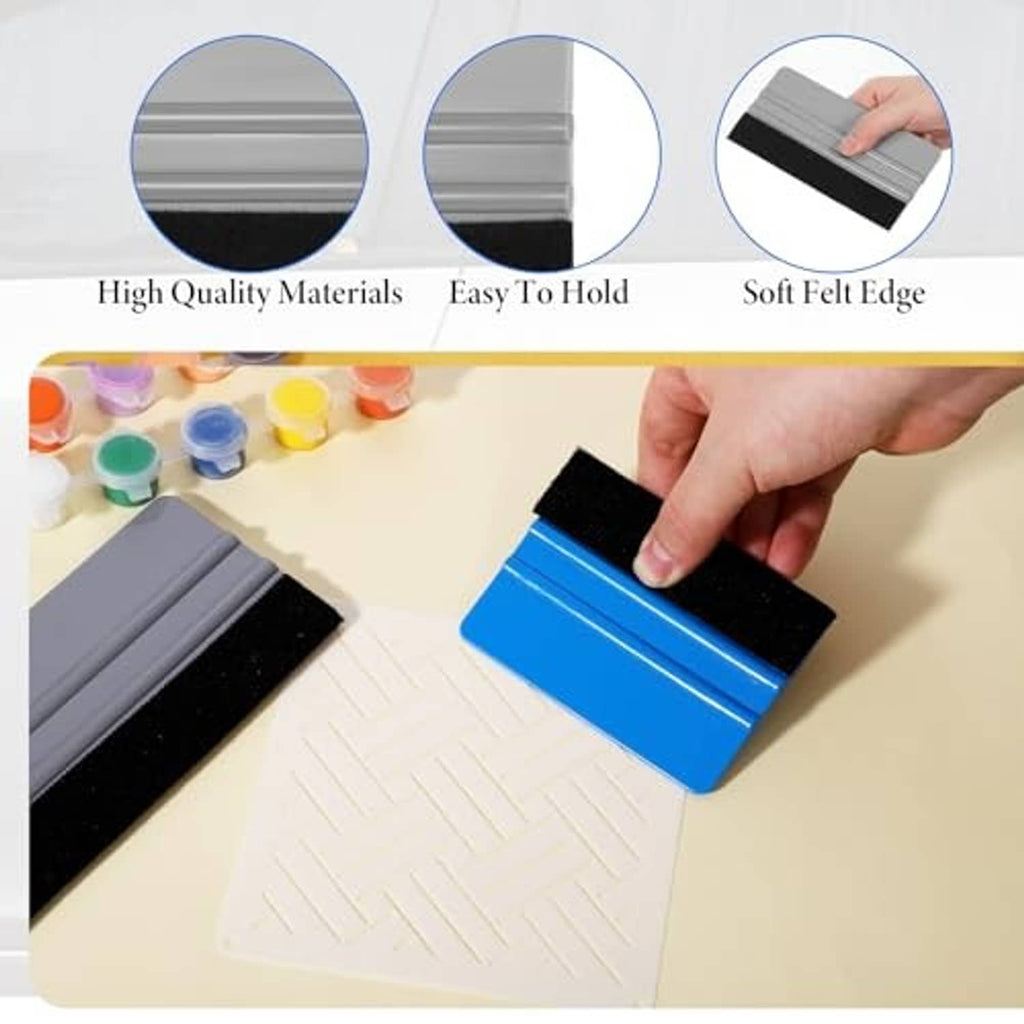 Vinyl wrap scraper tool with soft felt edge, blue handle being held