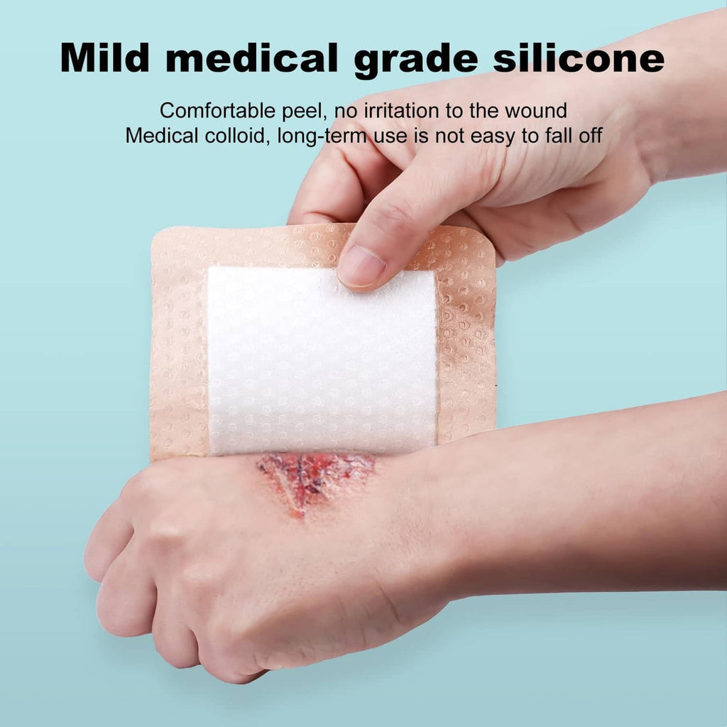 Silicone foam dressing pad on skin, beige border with white absorbent center