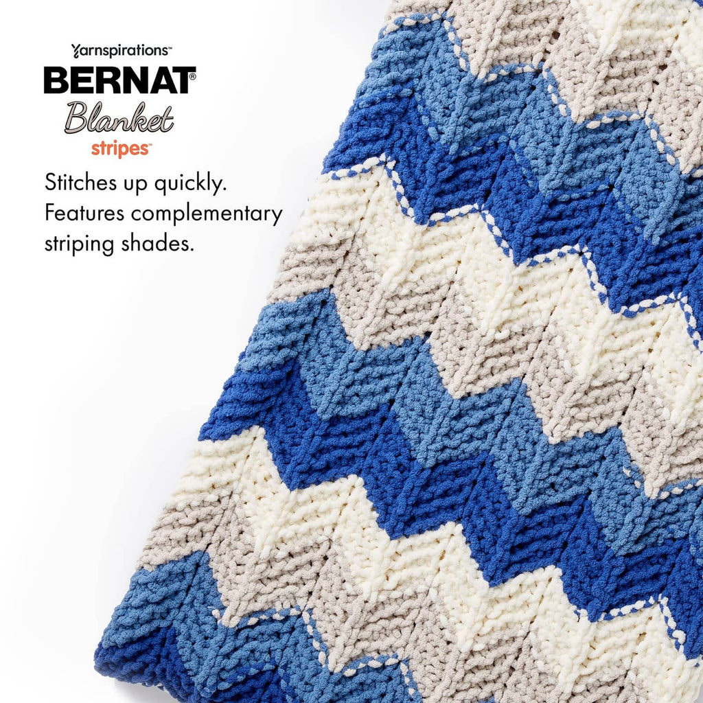 Striped knit swatch with zigzag pattern in teal blue and cream.