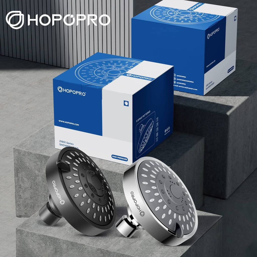 Matte black and silver shower heads with retail boxes and HOPOPRO branding