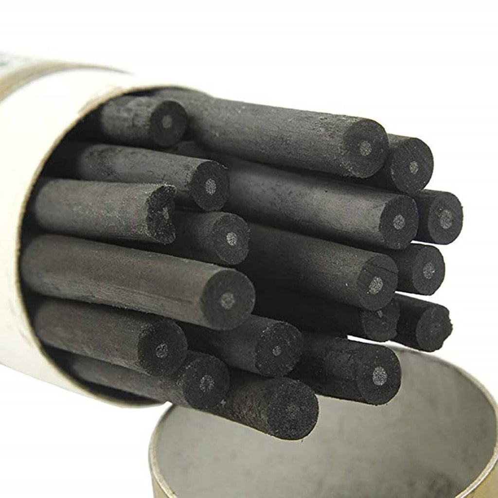Charcoal sketching sticks, dark gray/black cylinder shapes in a bundle