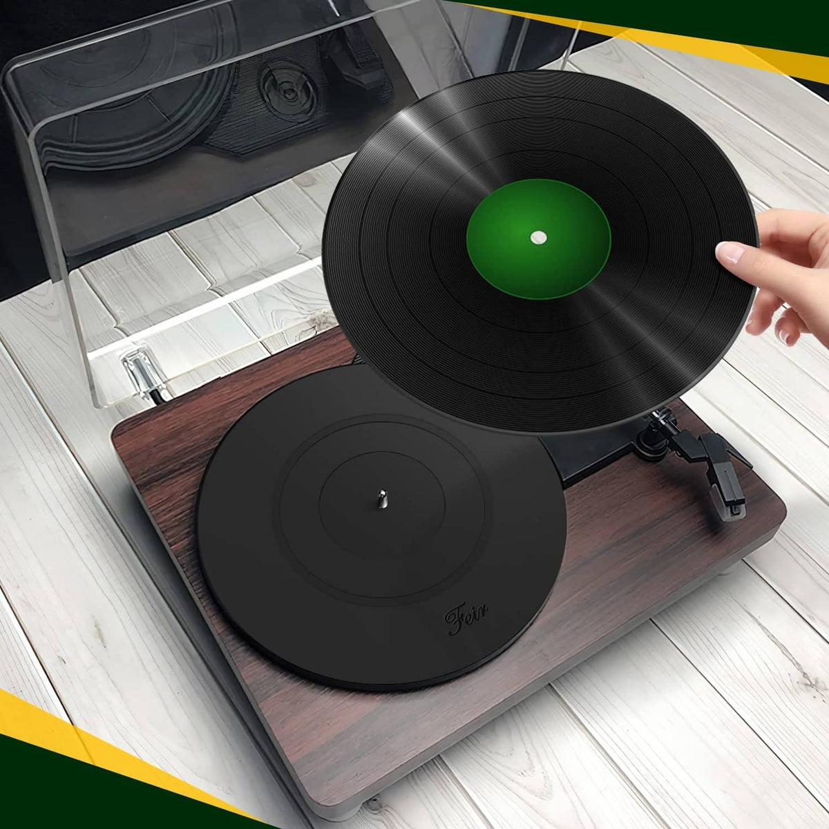 Black platter mat on turntable, featuring center hole and concentric ring grooves
