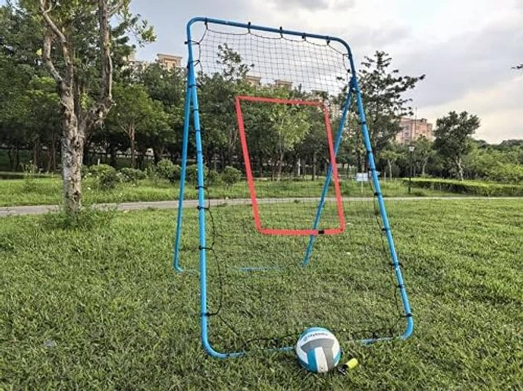 Blue adjustable volleyball rebounder net standing in a grassy field