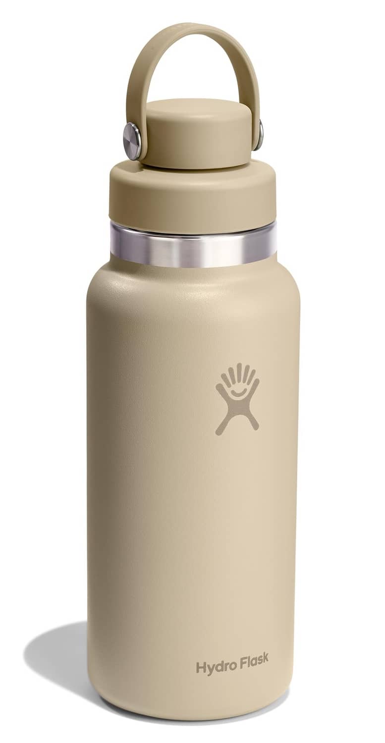 Insulated stainless steel water bottle with tonal oat lid and carry handle, side view.