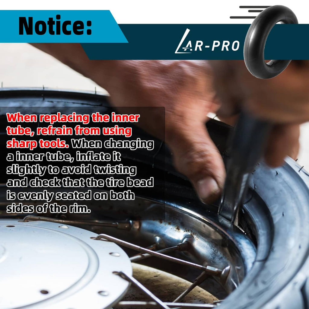 Black inner tube being installed on a wheel rim with valve stem