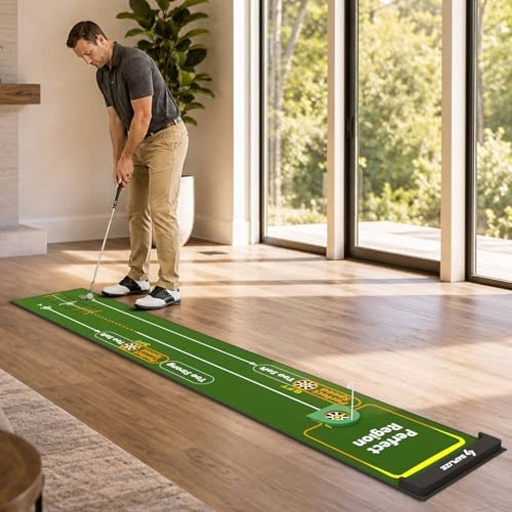 Green putting mat with alignment markings for indoor putting practice