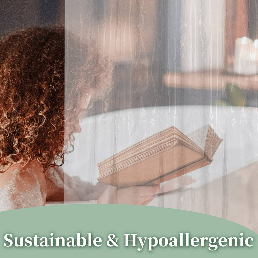 Clear shower curtain liner with see-through protection while showering.