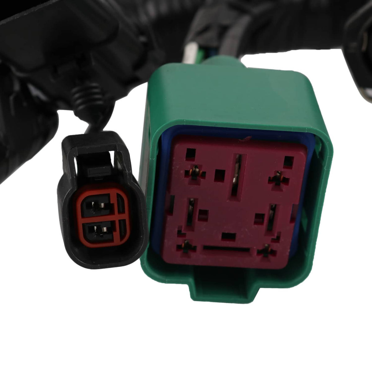 Wire harness connector with green outer housing and maroon multi-pin port
