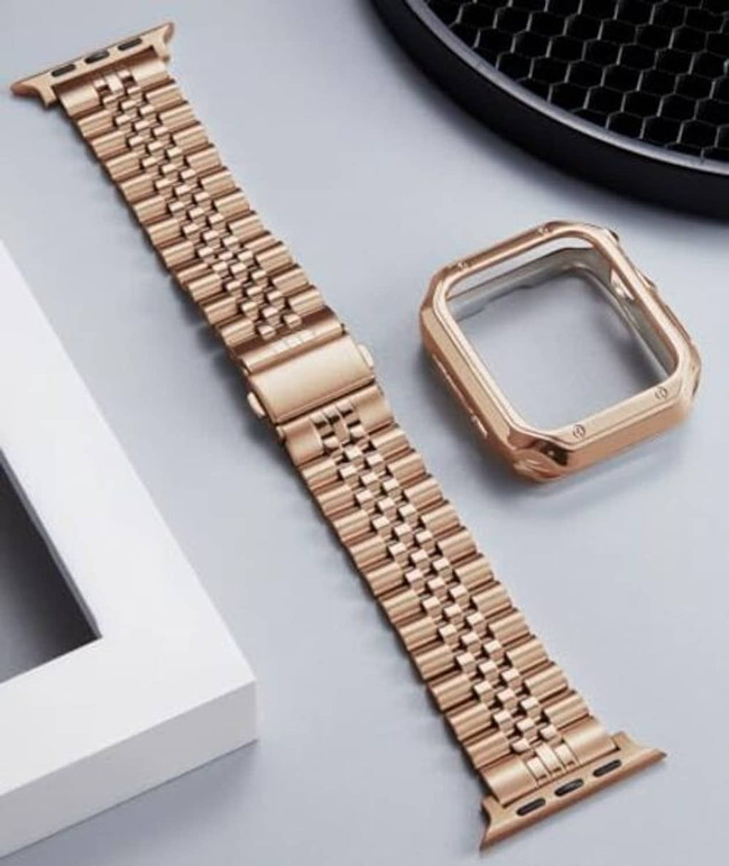 Rose gold metal link watch strap with adjustable end and metal case frame