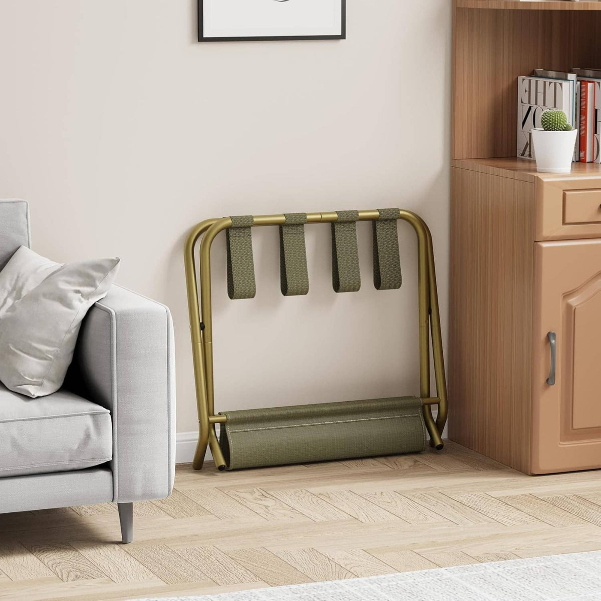 Foldable luggage rack in corner with front fabric loops and lower fabric storage shelf.