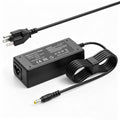 Black laptop power adapter charger with AC plug, DC barrel connector, and cable.