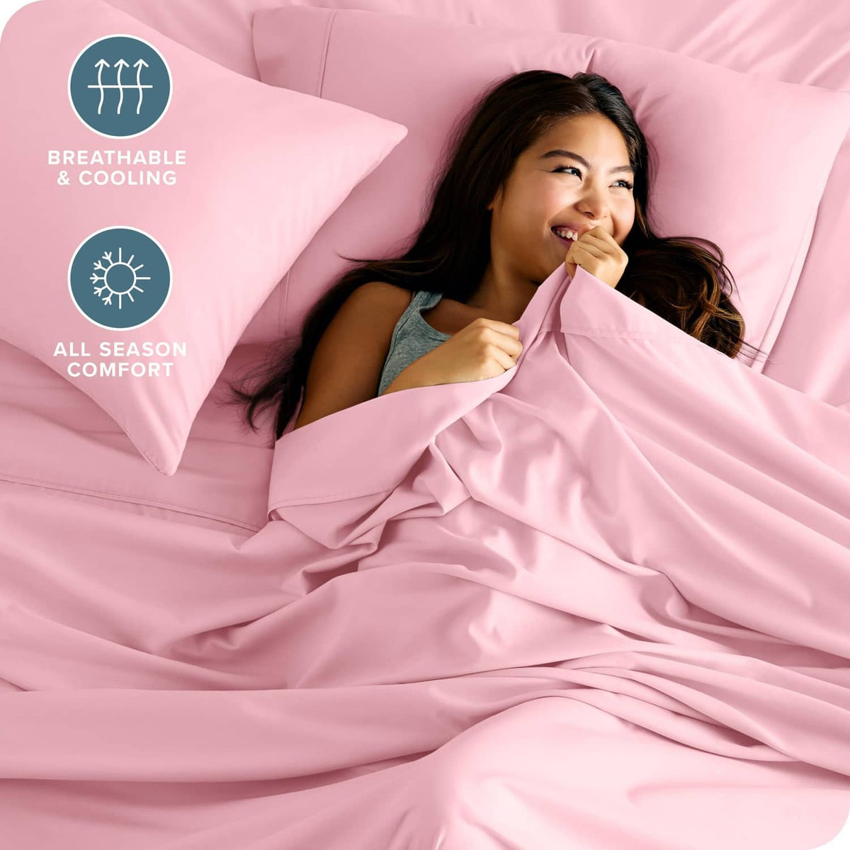 Light pink bedding duvet with matching pillowcases, soft wrinkled fabric texture