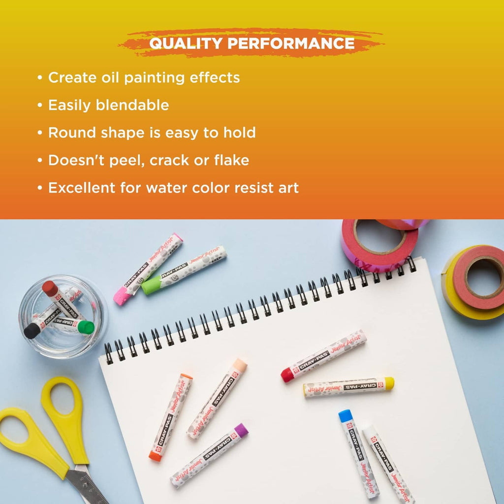 Oil pastel crayons set, assorted colored round sticks and tools arranged