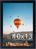Black 10x13 picture frame with hot-air balloon photo and mountains background