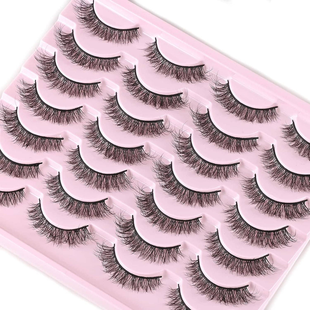 Angled pink tray with several pairs of natural short wispy false mink lashes