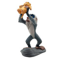 Rafiki toy figure holding Simba in raised arms, hand-painted details