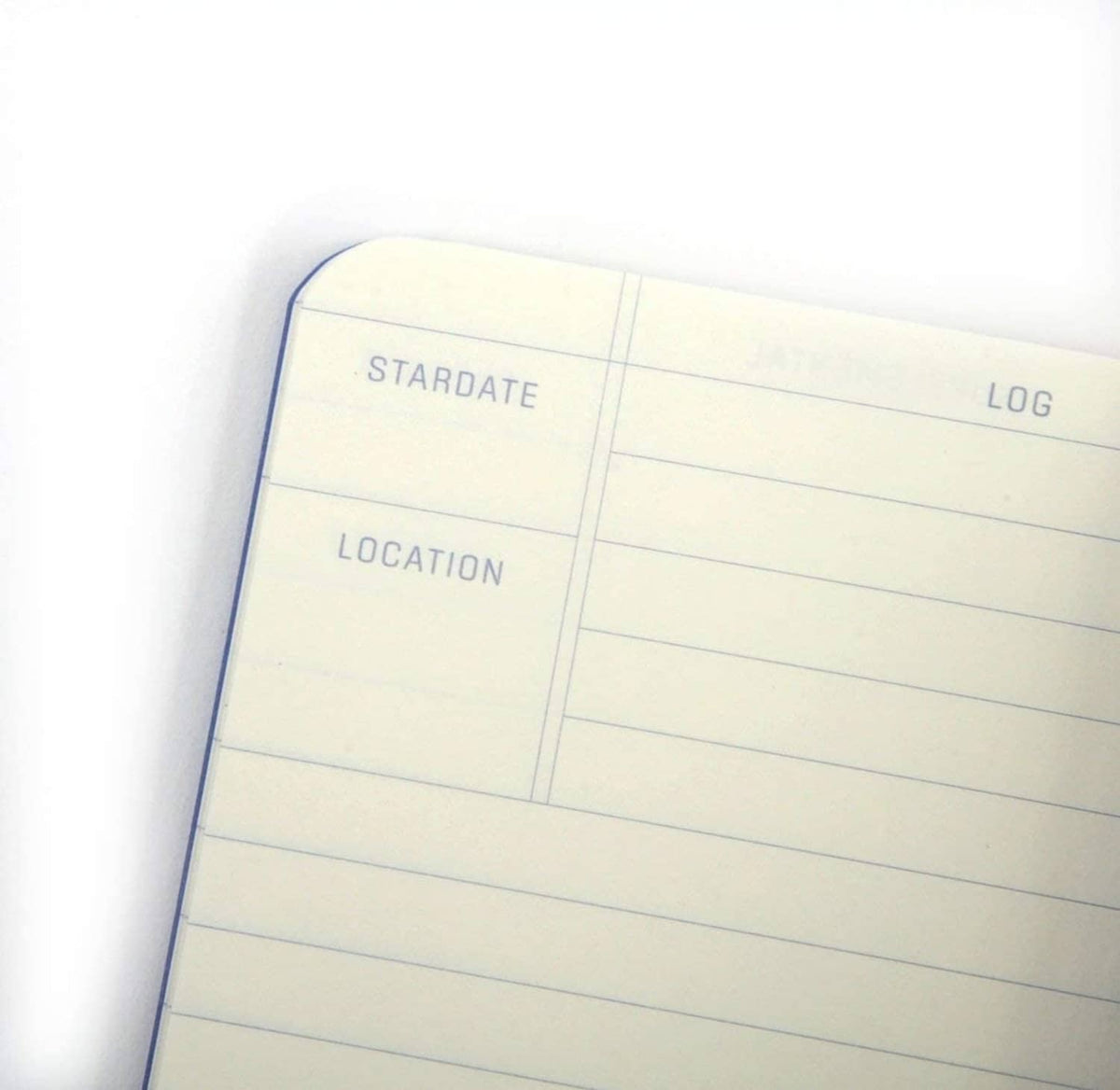 Close-up Captain's Log journal with Stardate and Location boxes on ruled pages