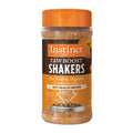 Dog food topper jar with orange cap and brown label; freeze-dried mix inside.