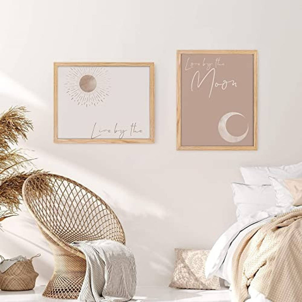 Wall-hung oak wood picture frame set with abstract prints, two frames visible