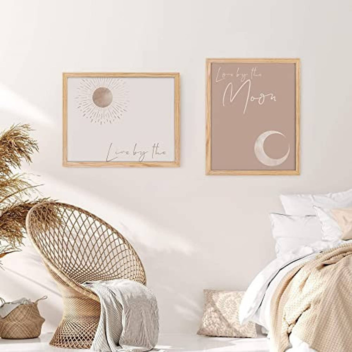 Wall-hung oak wood picture frame set with abstract prints, two frames visible