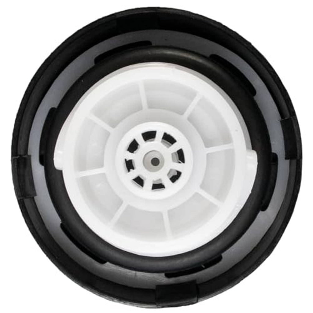 Fuel tank gas cap interior underside showing white wheel insert and black outer housing
