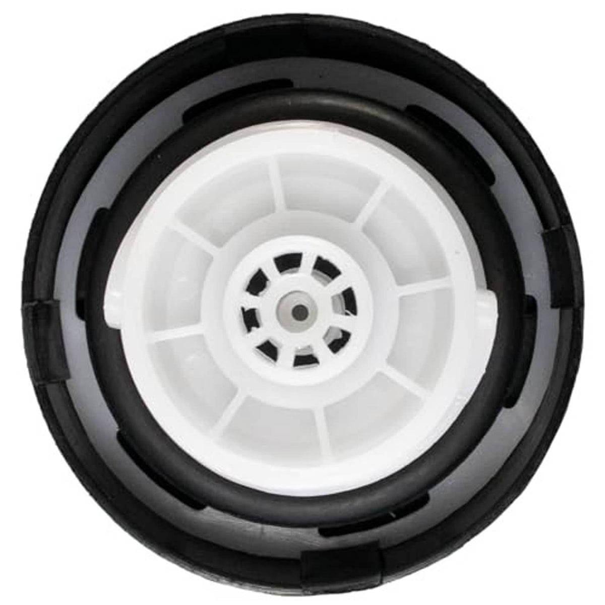 Fuel tank gas cap interior underside showing white wheel insert and black outer housing
