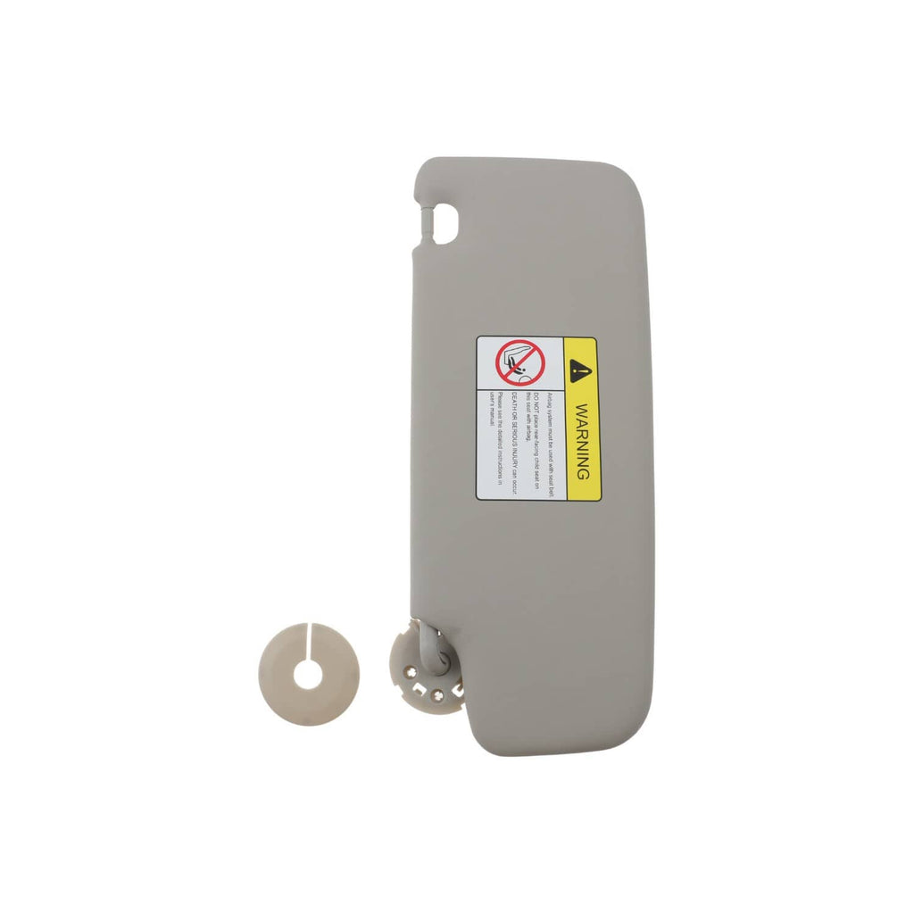 Gray left sun visor with warning label, mounting points, and included screw cover