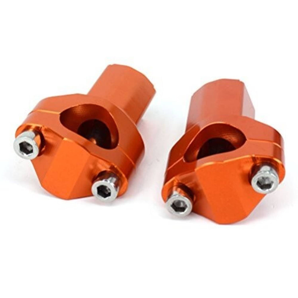 Orange handlebar riser clamps close-up showing black center openings and hex bolts