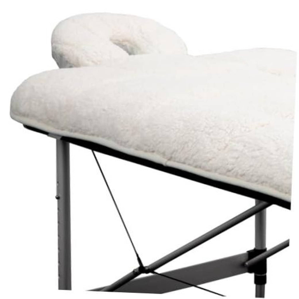 Natural quilted fleece table pad with rounded rolled edge, plush extra-soft cover.