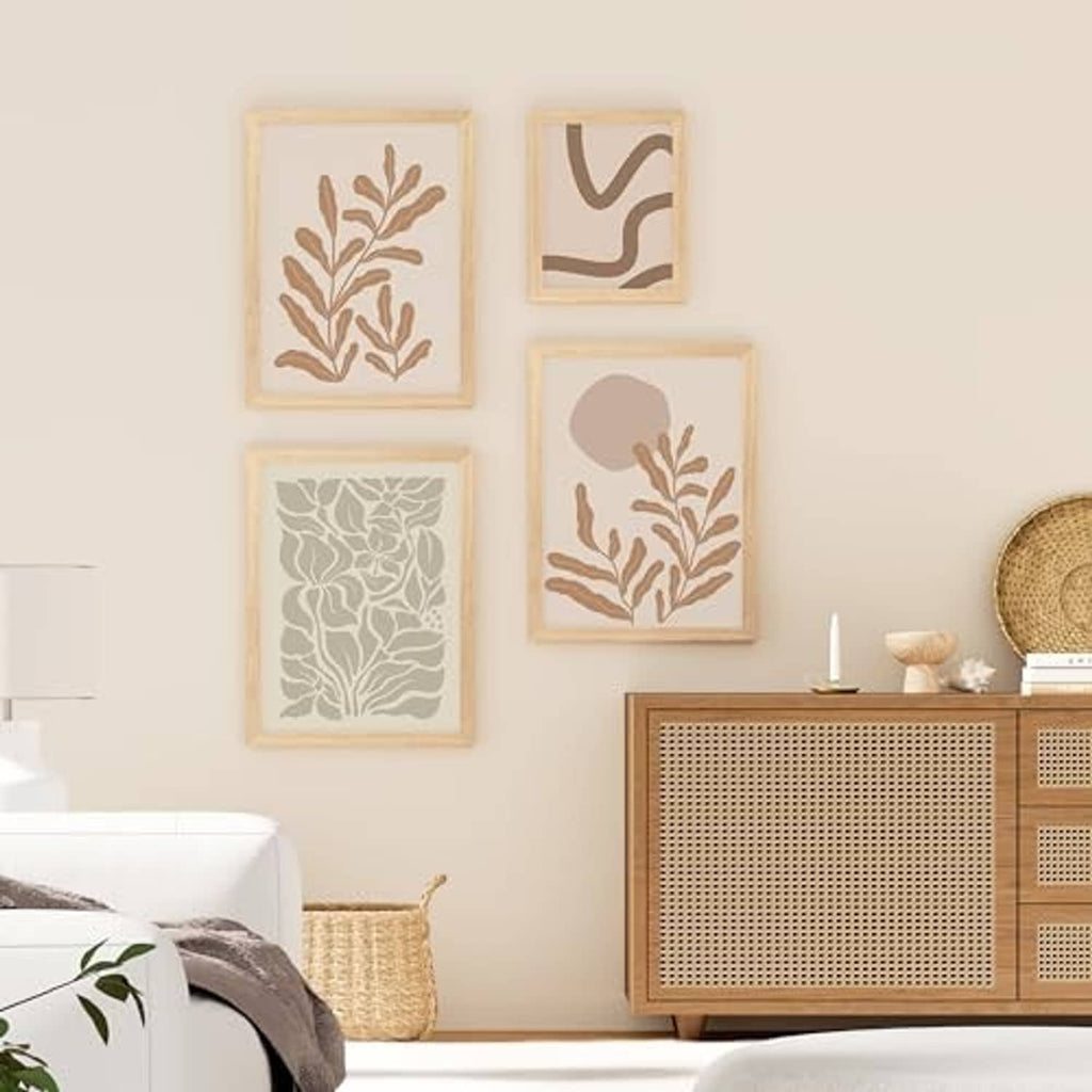 Multiple natural solid wood picture frames with clear plexiglass on wall, landscape and portrait
