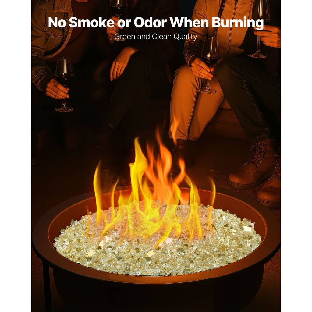 Gold fire pit glass rocks in a bowl fire pit with open flames
