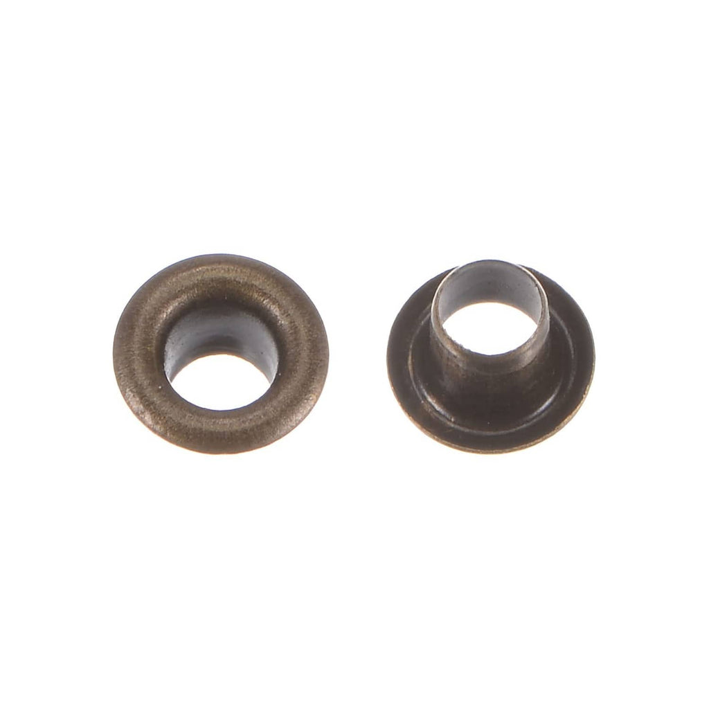 Bronze metal grommet eyelet and backing cap, angled side view