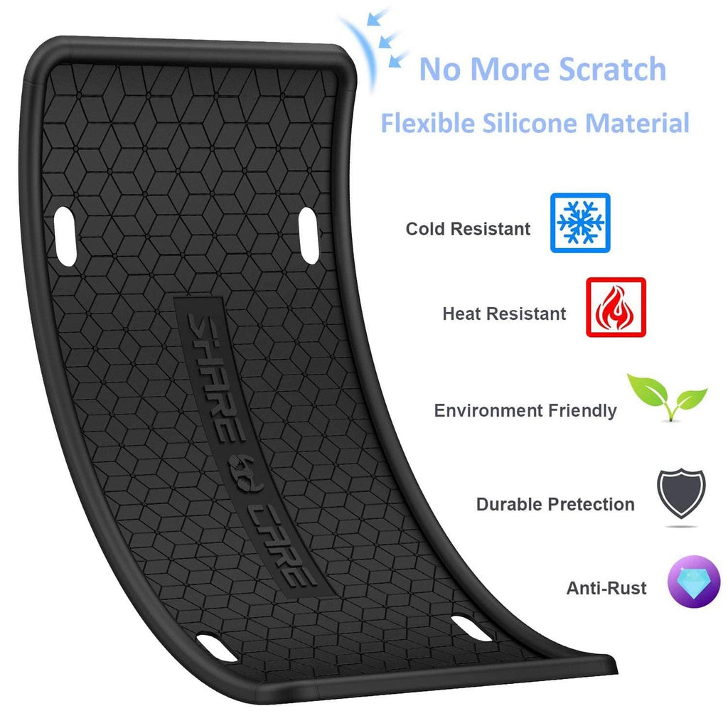 Black flexible silicone license plate frame with hex texture and mounting cutouts.