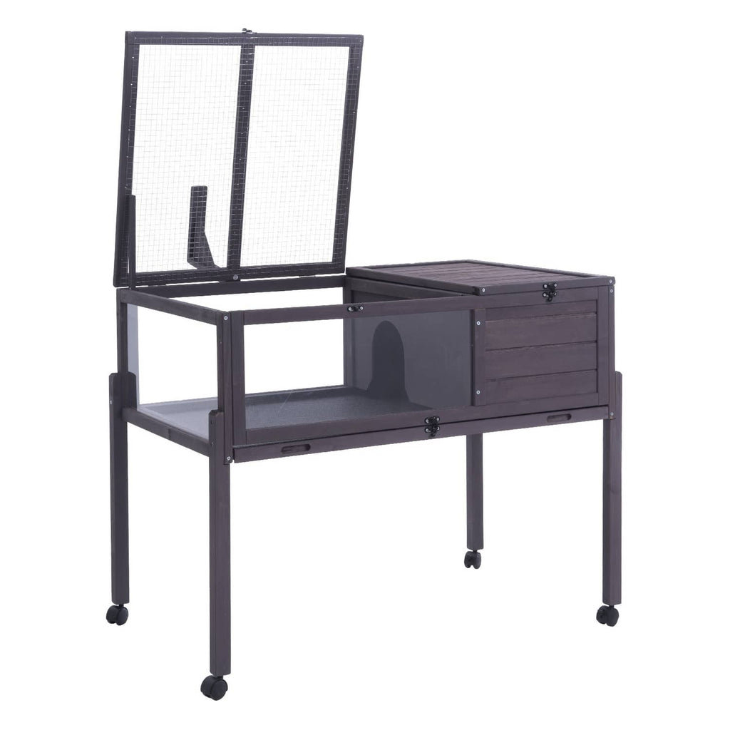 Dark wooden tortoise enclosure on casters with mesh top and front storage drawer
