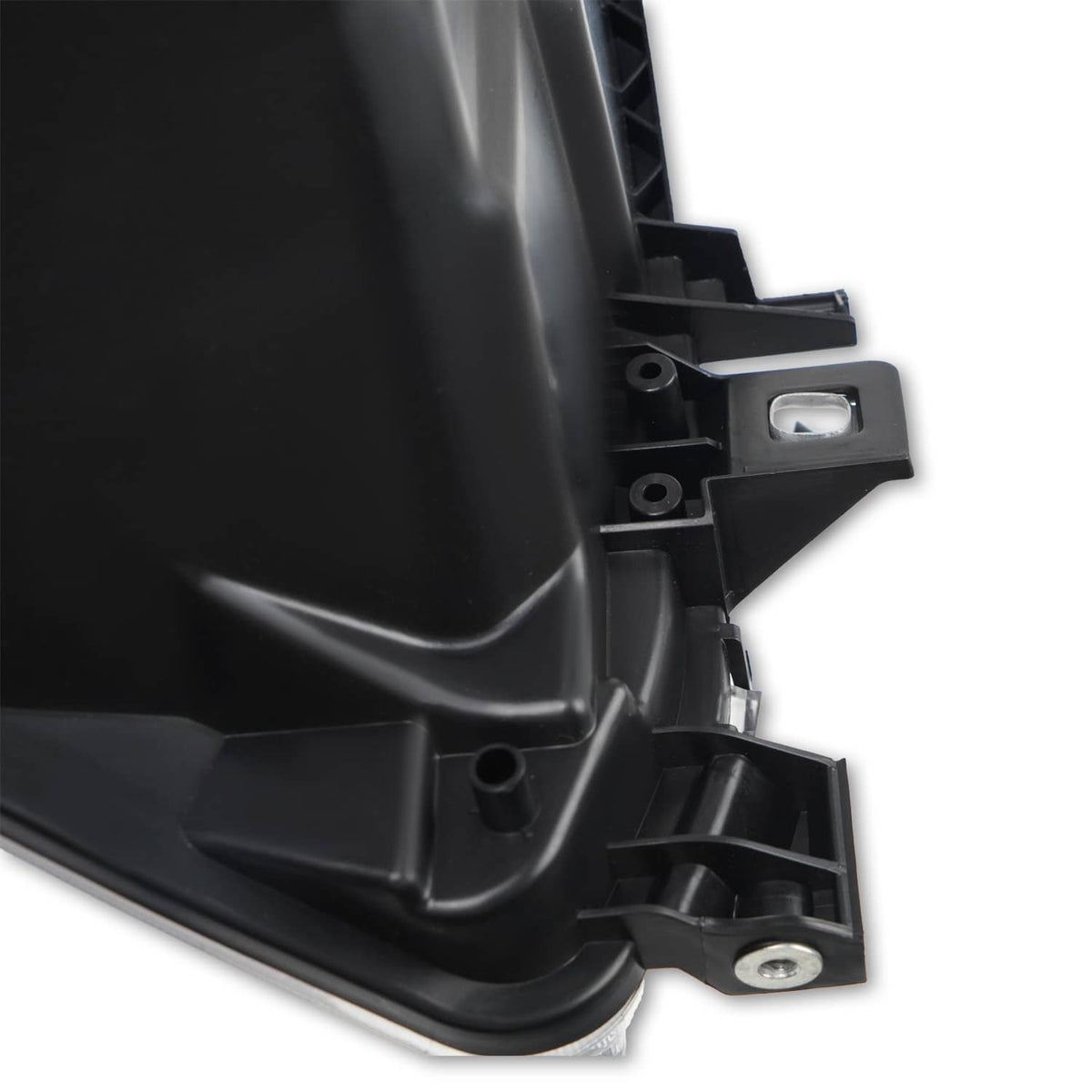 Black headlight housing with mounting bracket and reflector detail