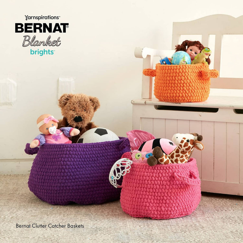 Chenille crochet storage baskets in purple, pink, and orange with toys
