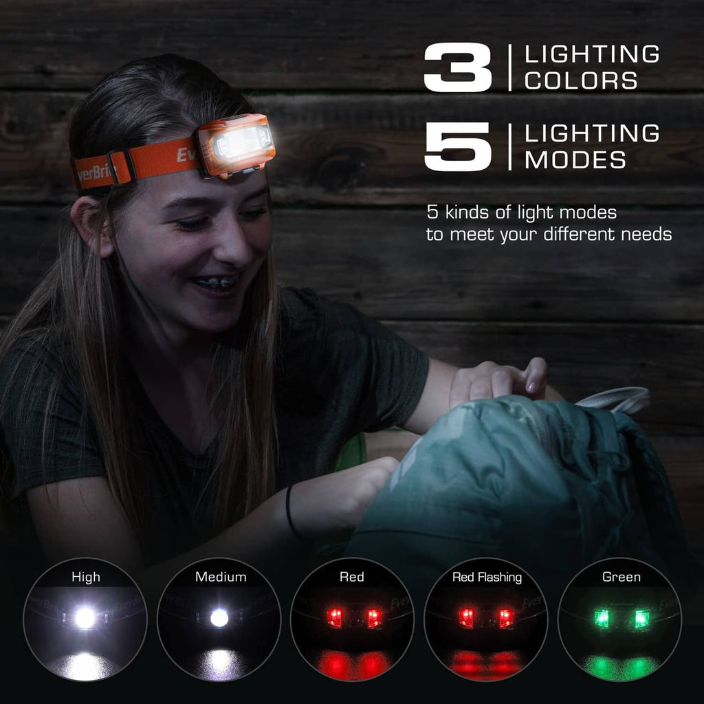Kids headlamp pair on orange straps showing red and green light modes.