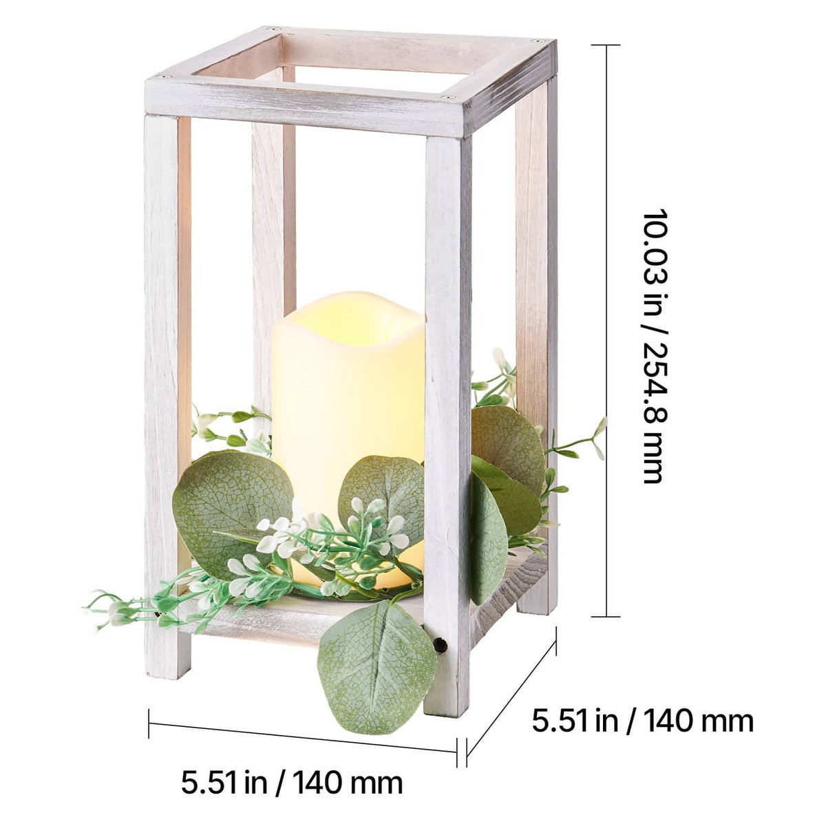 White wooden lantern with LED candle and faux eucalyptus greenery, front close-up