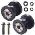 Pair of black chain roller pulley tensioner wheels with bearings and mounting bolts
