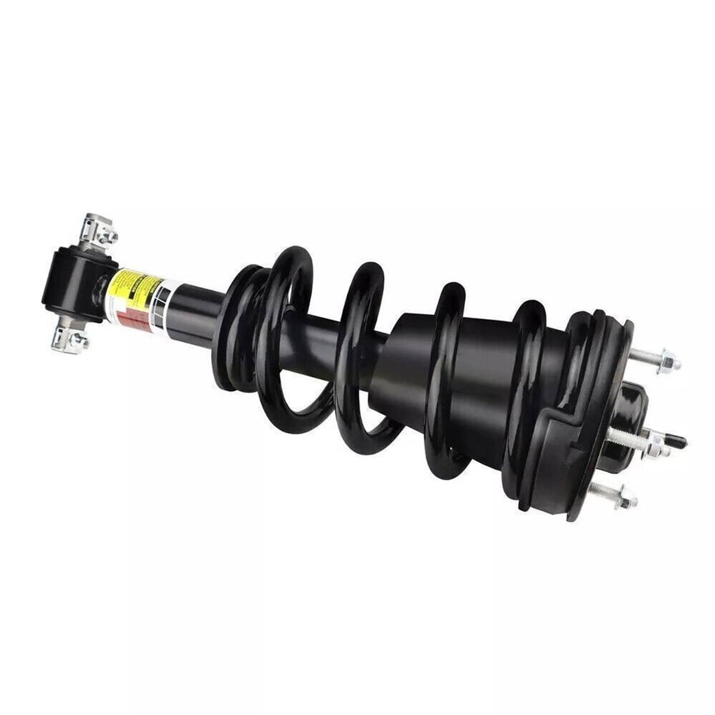Front shock strut with black coil spring, damper cylinder and side mounting links