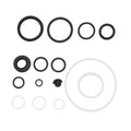 Assorted O-ring seal repair kit with black and clear rings and small rubber cap